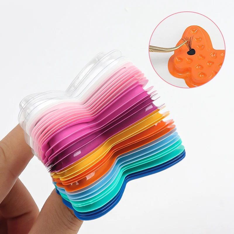 100Pcs Eyelash Glue Holder Pad Tray Plastic Gasket Lashes Extension Adhesive Pallet Butterfly Shape Liquid Pigment Storage Tools