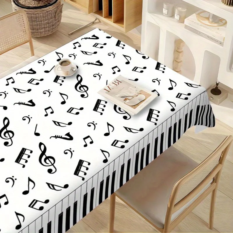 One polyester tablecloth, with a simple style and symmetrical lace edge, featuring a colorful print of musical notes.PMJ