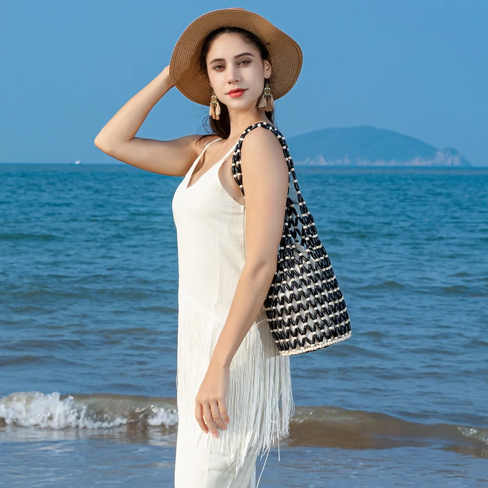 

Wooden bead handmade woven beaded bag, travel shoulder bag, seaside holiday tote bucket bag