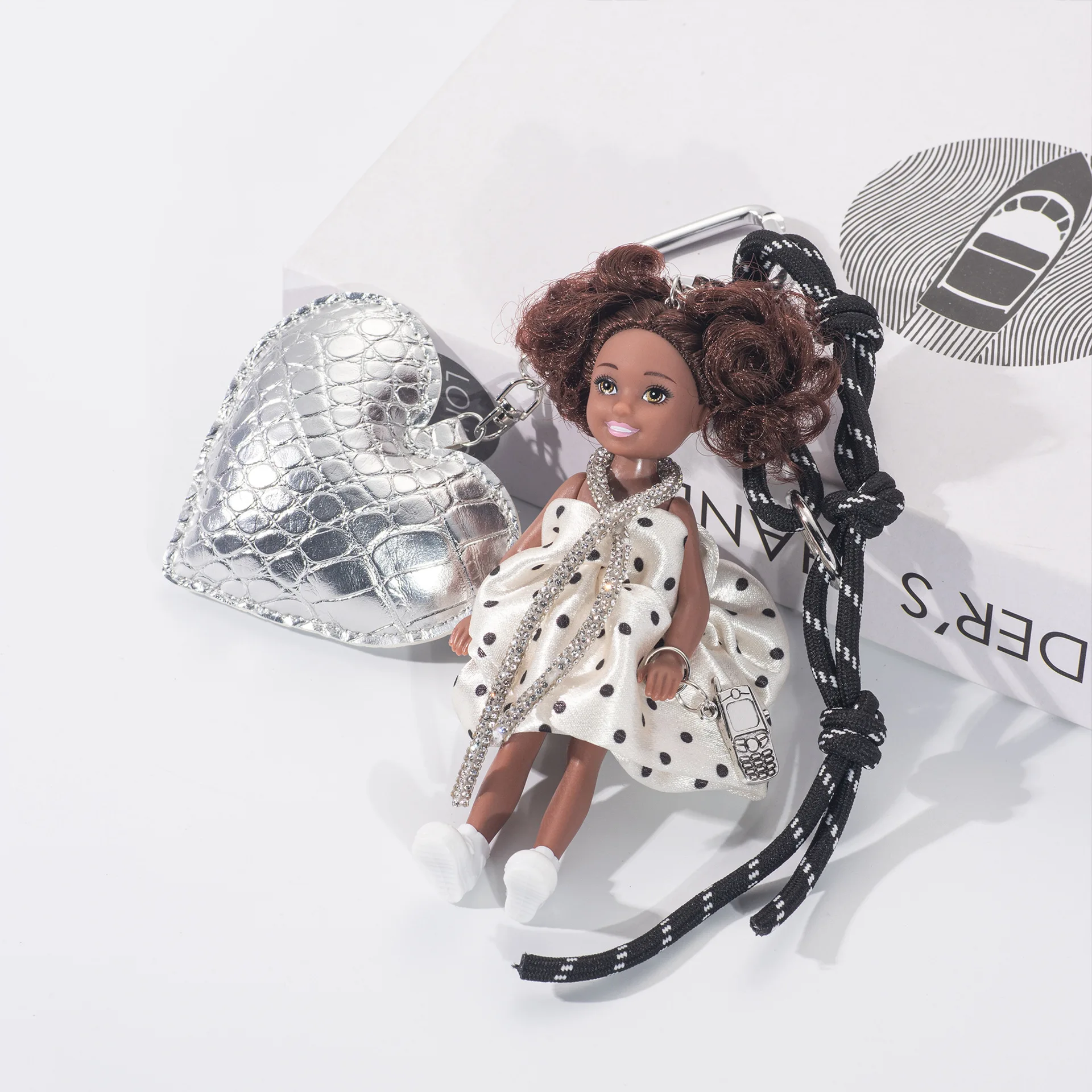 

Elegant Sweet-Cool Polka Dot Dress Fashion Doll Keychain with Silver Crocodile Heart Bag & Mini Phone Pendant Woven Lanyard Bag