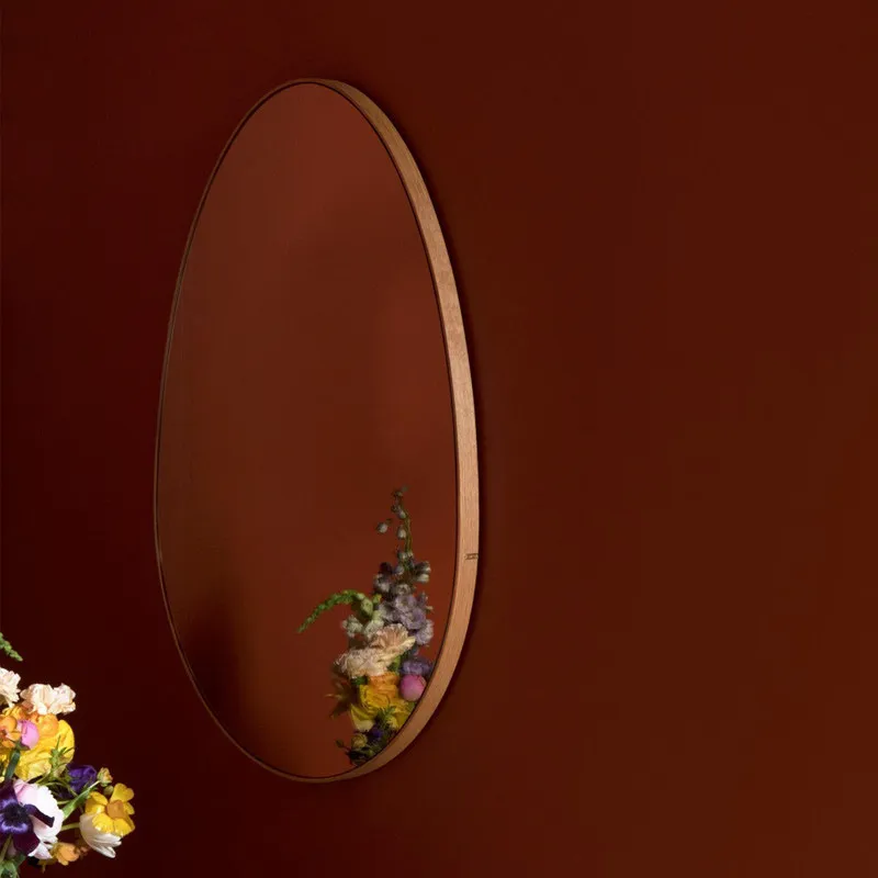 Egg mirror light luxury bathroom mirror, wall-mounted French minimalist irregular oval makeup mirror