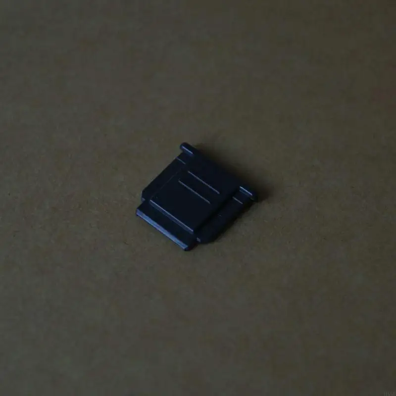H55F Plastique Hot Shoe Cover Caper