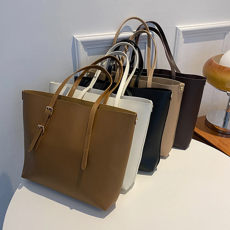 Nuova borsa a tracolla tote versatile, di grande capacità, semplice, casual, alla moda e alla moda