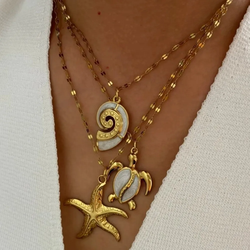 Collar con colgante de estrella de mar de esmalte blanco, elementos oceánicos, diseño de concha de tortuga, temperamento Retro