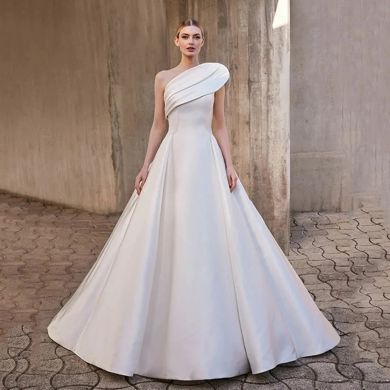 

Современное свадебное платье трапециевидной формы на одно плечо Vestidos De Novia, свадебное платье без рукавов, свадебное платье без бретелек по индивидуальному заказу 2025