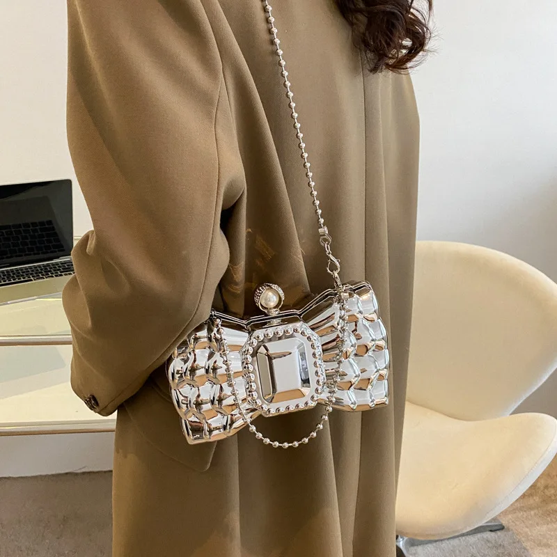 2023 Luxury Acrylic Pvc Bow Shaped Lipstick Bag Creative Personality Mini Small Bag Fashion Metal Chain Crossbody Bag For Women