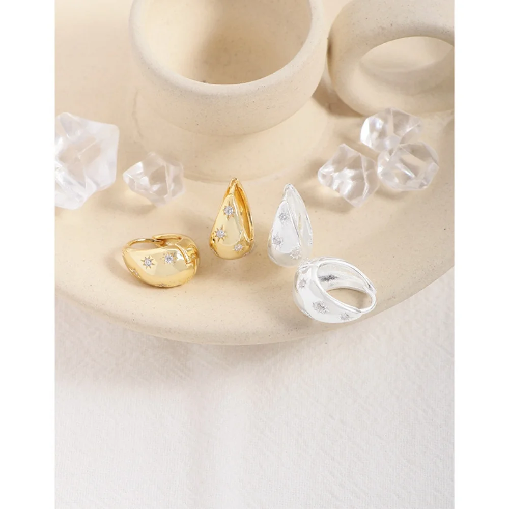 

Серьги-луги из стерлингового серебра 925 пробы со звездами и цирконами — подчеркивающее лицо нишевого дизайна