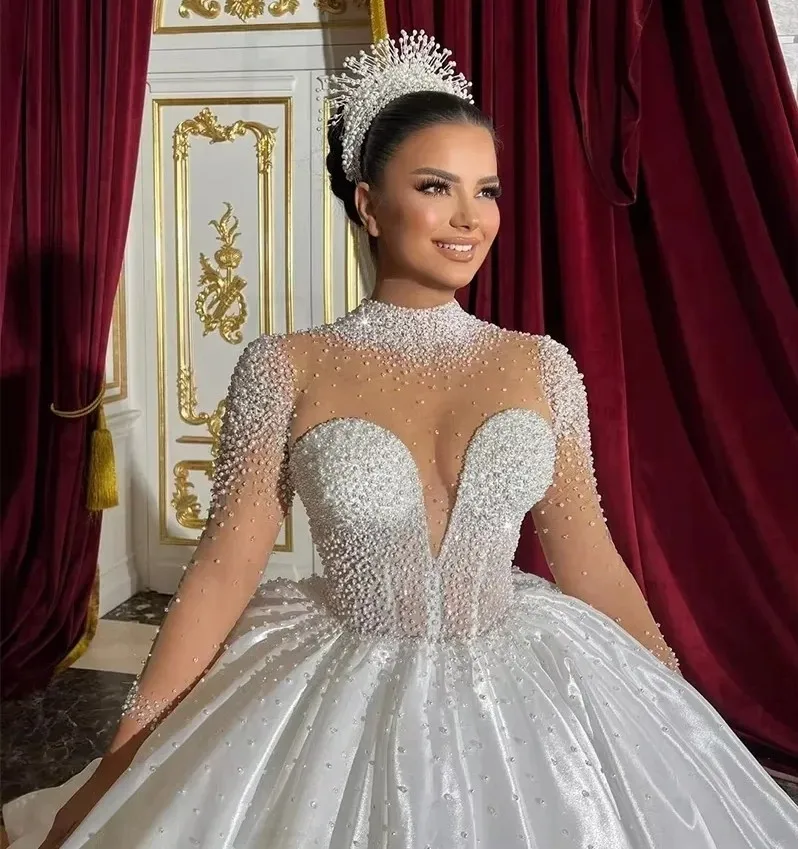 

2026 Arabic Aso Ebi Wedding Dresses Long Sleeves High Neck Beads Pearls Satin Princess Bridal Gowns Dress Vestidos De Noiva