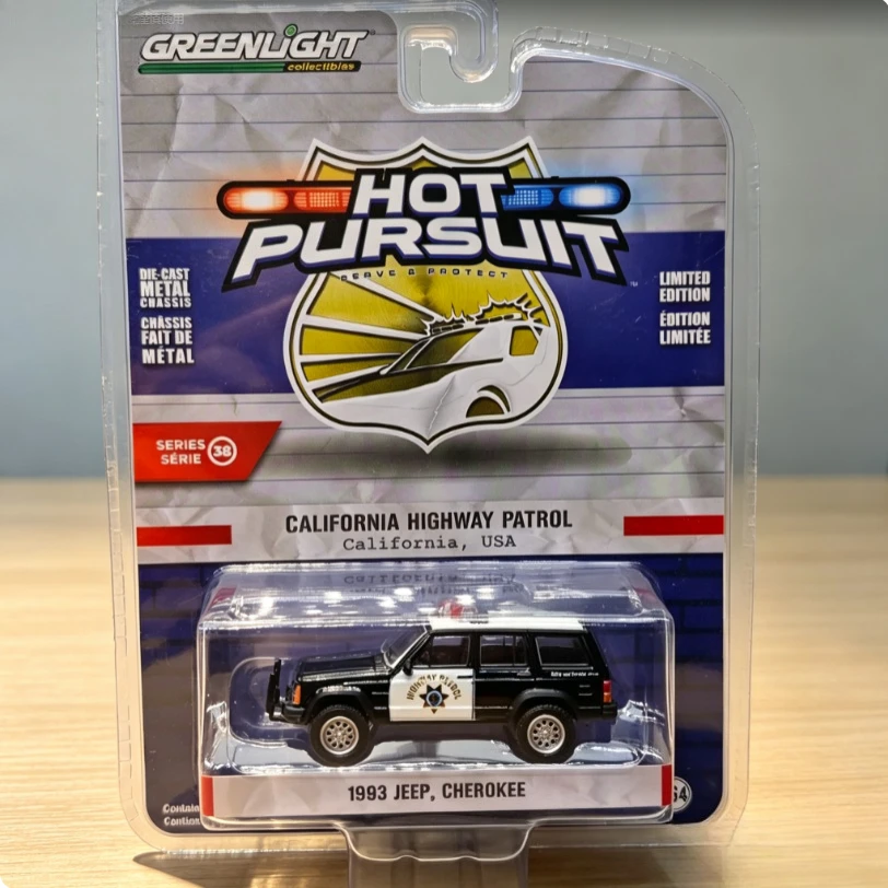 Greenlight 1:64 Hot Chasing Brown Series 38 - 1993 Jeep Building Nokey - California Highway Patrol Police Car