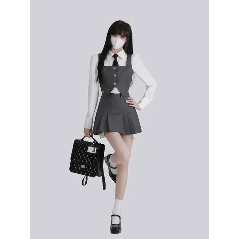 Conjunto de tres piezas para mujer, Blazer largo a la cintura con botonadura única, chaleco gris, Falda plisada gris, estilo universitario, 2023