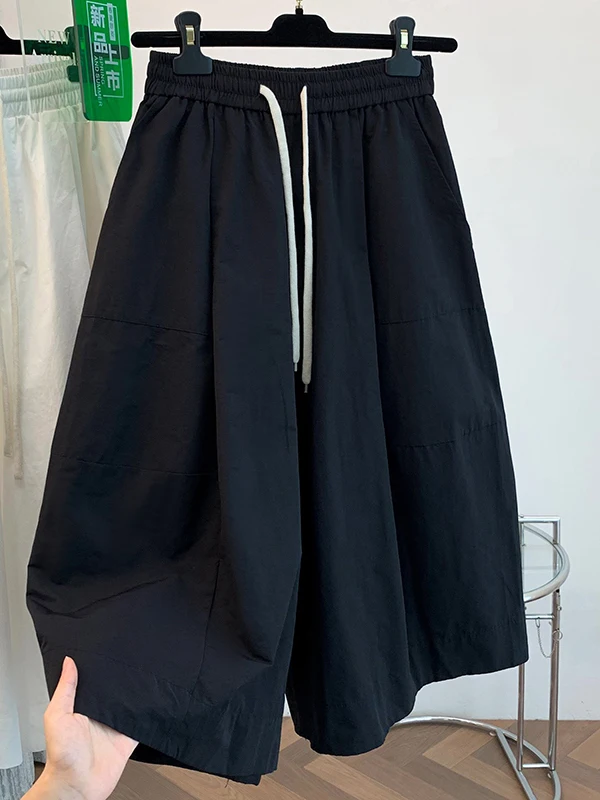 ゆったりとしたワイドレッグパンツ、怠惰なスタイル、ルーズカフ、薄い夏のカジュアルな七分丈スカート、女性用プラスサイズのズボン、快適なフィット感