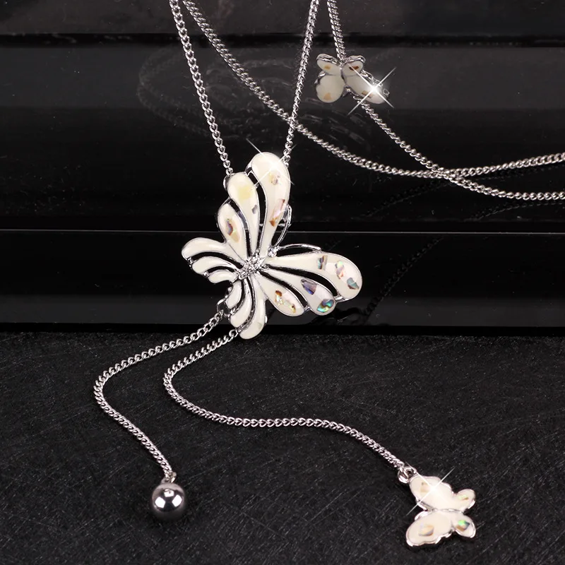 

The new double butterfly sweater chain is a fashionable, simple and versatile long necklace for women