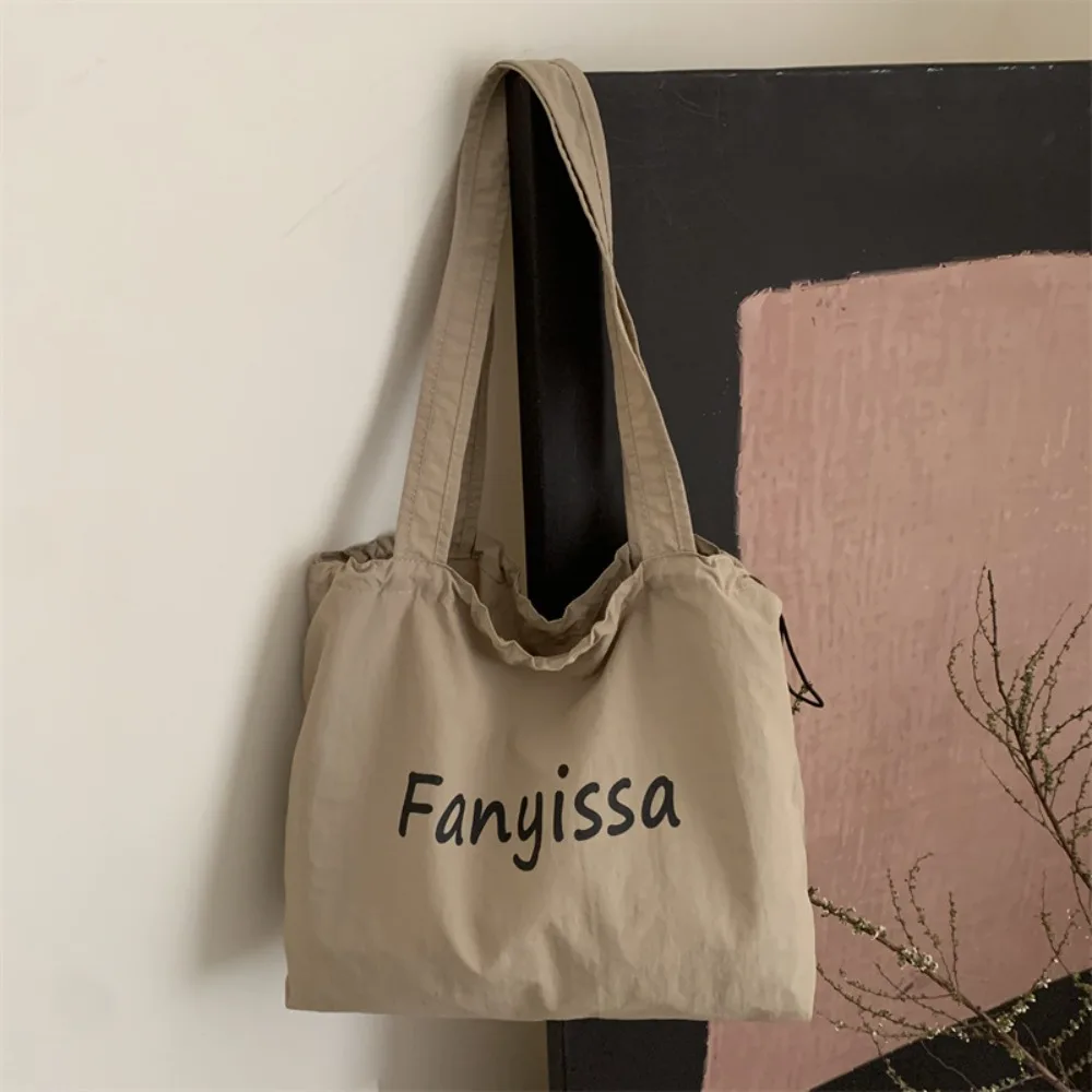 

Ins Korean Drawstring Tote Bags Lightweight Large Capacity Letter Shoulder Bag Casual Designer Shopping Bag Daily
