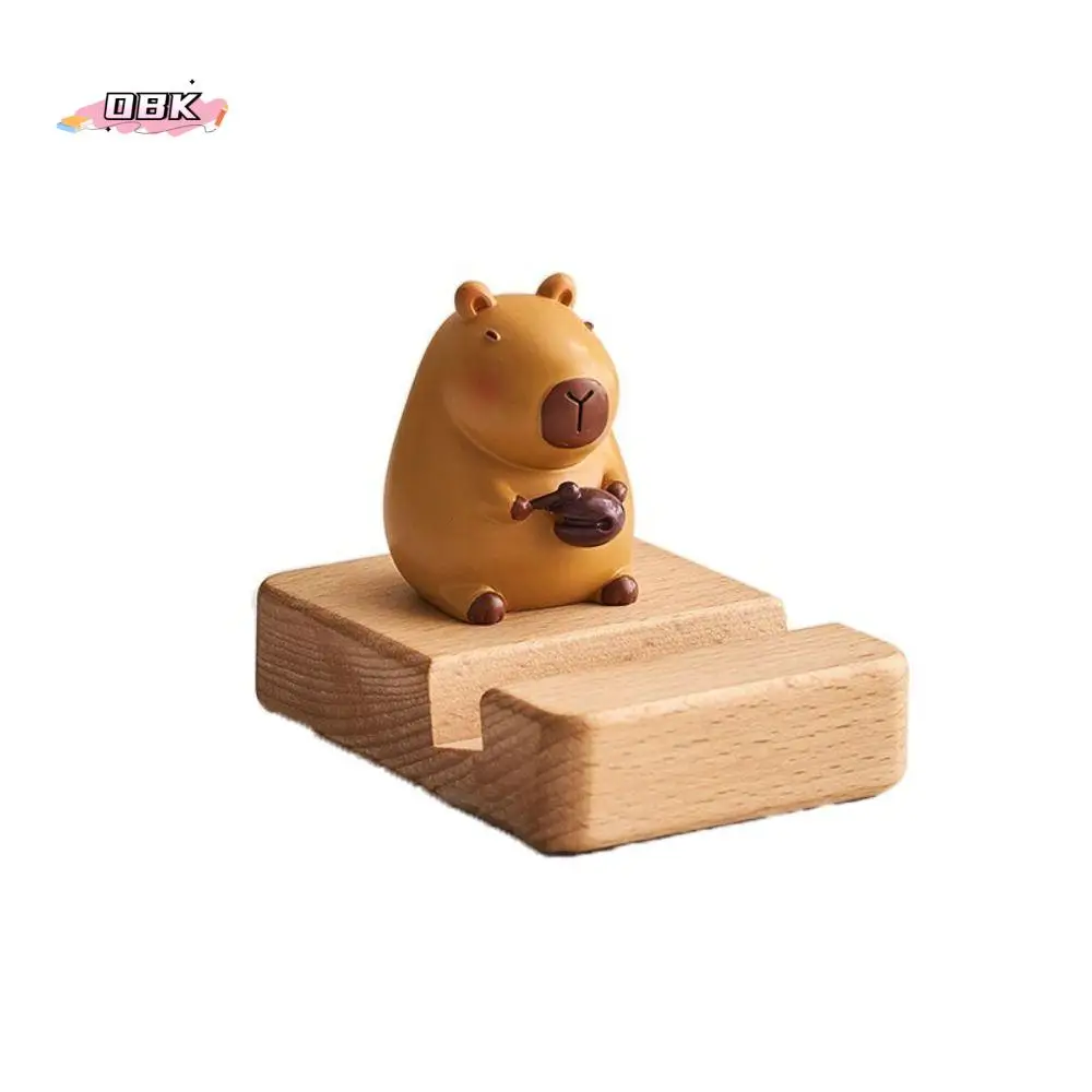 

Фигурка Модель Капибара Держатель для телефона Поддержка Декор стола Капибара Подставка для мобильного телефона Деревянный мультяшный капибара Кронштейн для мобильного телефона