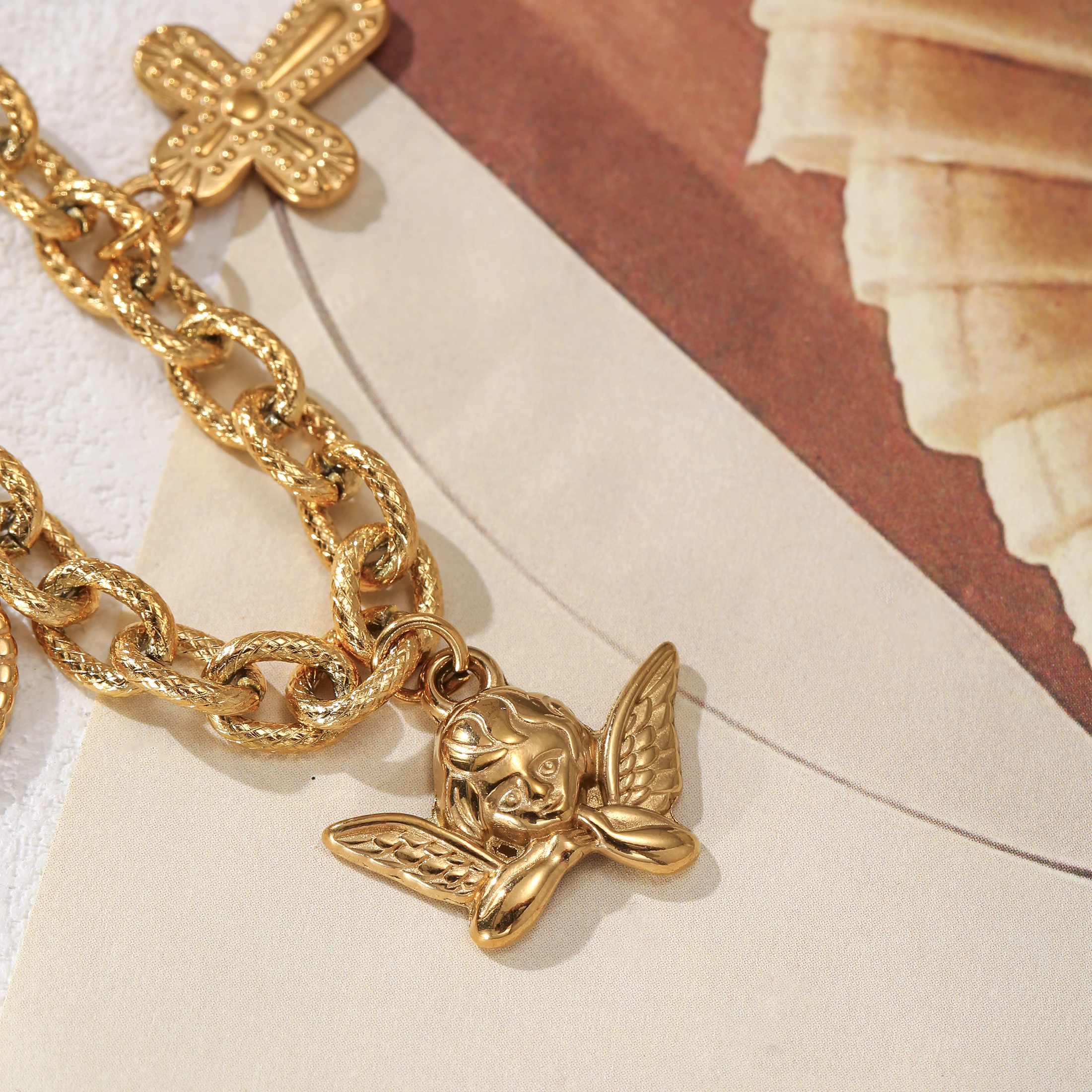 Golden Tone Stainless Steel Charm Bracelet with Cross and Angel Pendants for Women