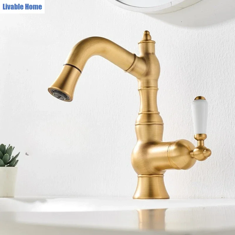 French-style gold-toned brass pull-out mixer tap Luxury vintage bathroom cabinet with ceramic-handled swivel hot/cold mixer tap