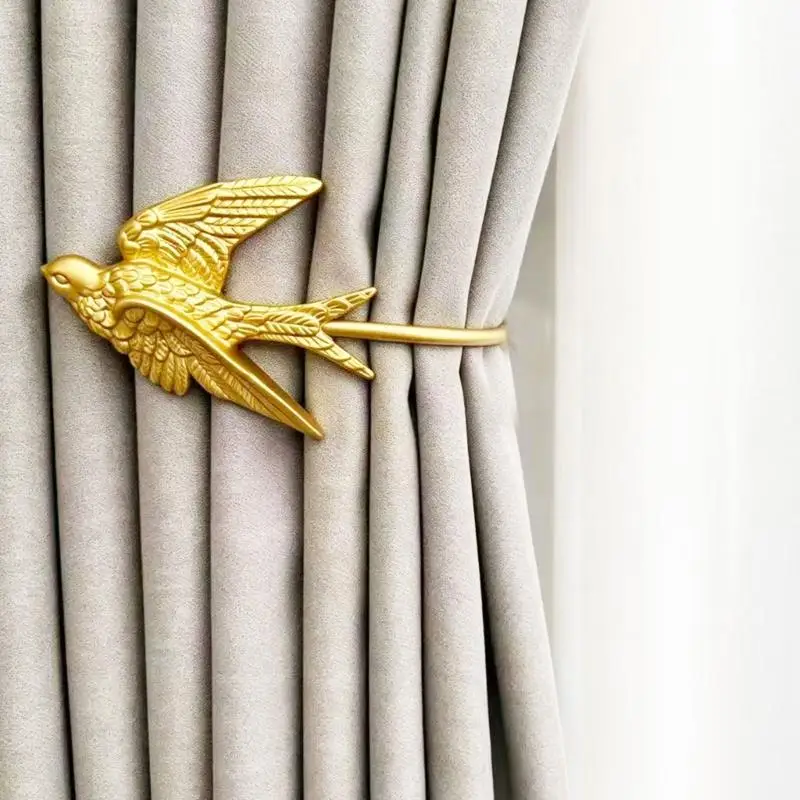 652F Window Curtain Holdback Pair with Decorative Swallow Forms in Plastic