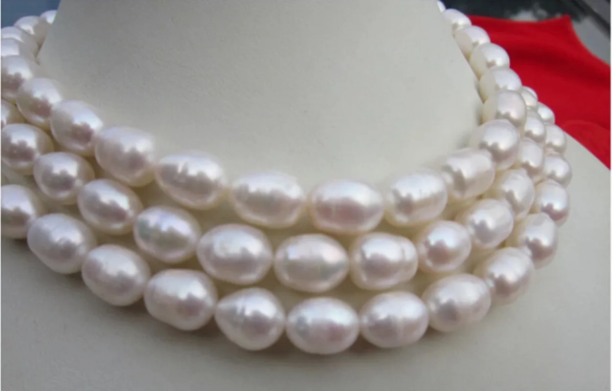 

Hand knotted necklace natural 9-10mm white freshwater rice pearl sweater chain nearly oval pearl 50inch