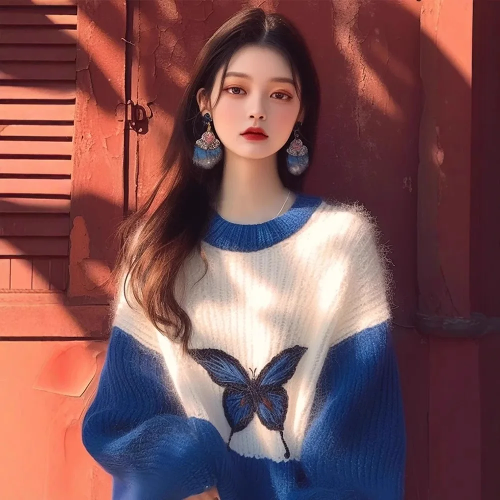 

Klein Blue Relief Knit Top: Sculptural Butterfly Print Sweater for Women - Lounge to Gallery Spring Statement Piece