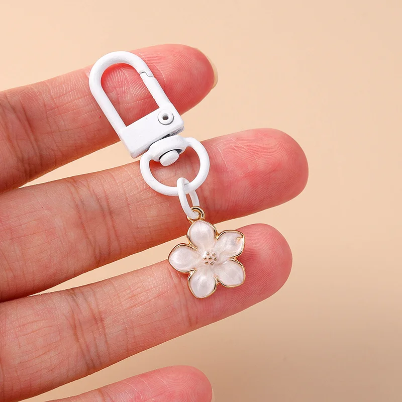 Aihua Niedlicher Klingelnder Blumen-Schmetterling-Herz-Schlüsselanhänger für Frauen und Mädchen, Handtaschenanhänger, Schlüsselkette, Schmuckzubehör, Geschenke – Detail 17