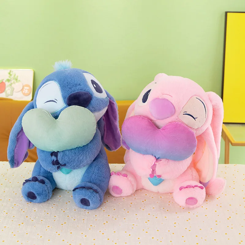 Peluche ripiene Kawaii simpatico cartone animato punto che abbraccia il cuore bambola angelo riempimento regalo di compleanno per bambini gioco di redenzione del premio di peluche