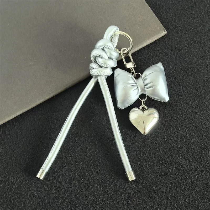 

Новая серия, кожаная сумка с бантом в форме сердца, подвесной кулон, брелок, ювелирные изделия, подарочные украшения, аксессуары