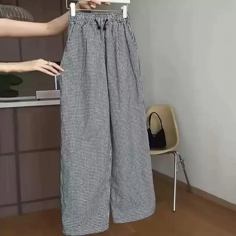 Grille pantalons décontractés femmes été nouvelle mode élastique taille haute jambe large élégant Tube droit