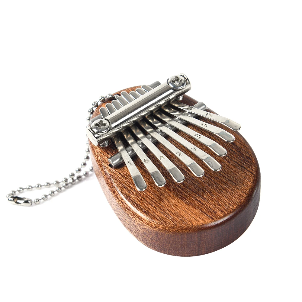 

8 Key Mini Portable Thumb Piano Finger Percussion Keyboard Musical Instrument Christmas Present Pendant 8 Key Thumb Piano