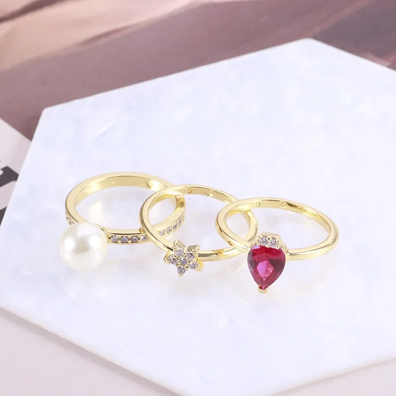 

KS European and American Sweet and Beautiful Shining Red Love Water Drop Pearl Five-pointed Star Three-piece Ring
