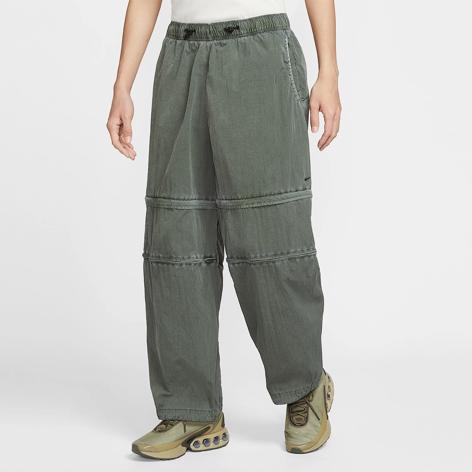 

Оригинальные мужские длинные брюки Nike Tech с отстегивающимся поясом на молнии HJ2949-355