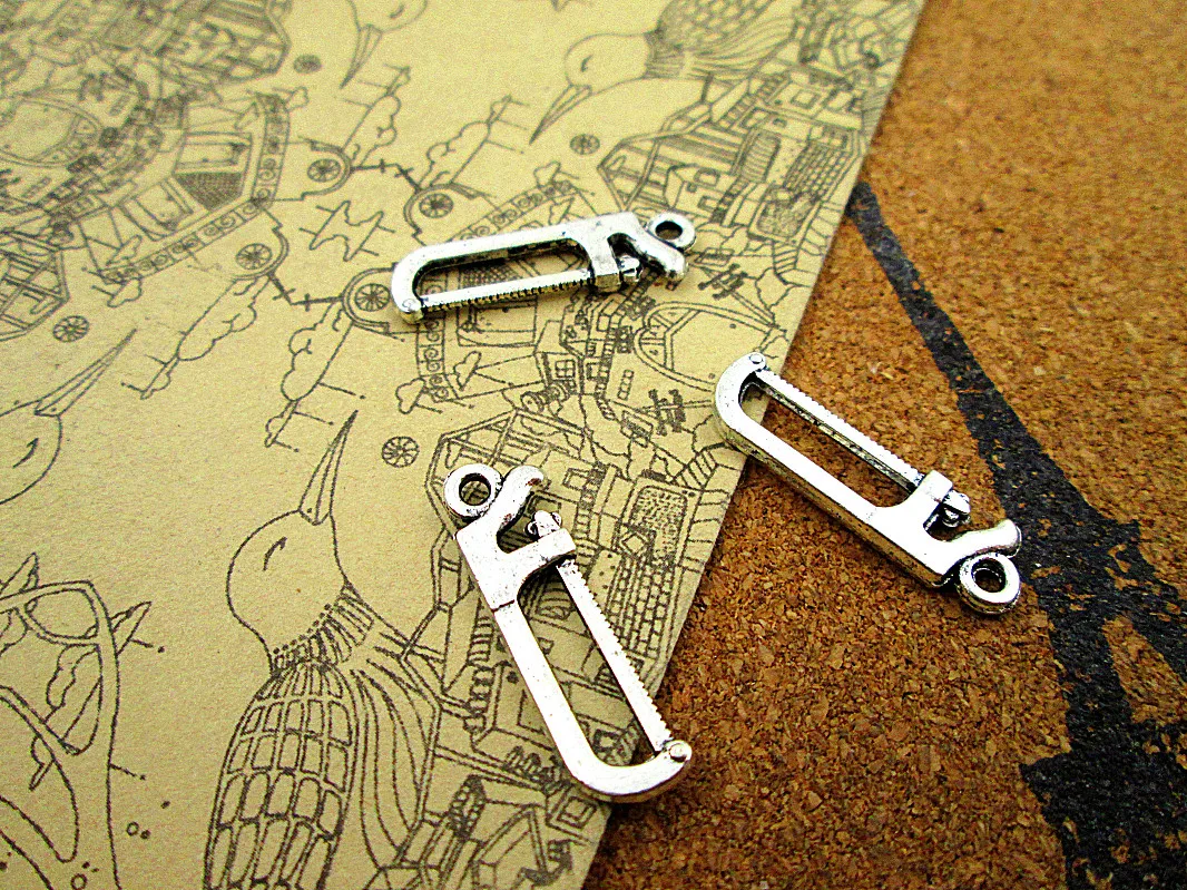 

120pcs-- 26x7mm Mini Hack Saw Charms For Jewelry Making DIY Findings Antique Silver Color Alloy Pendants