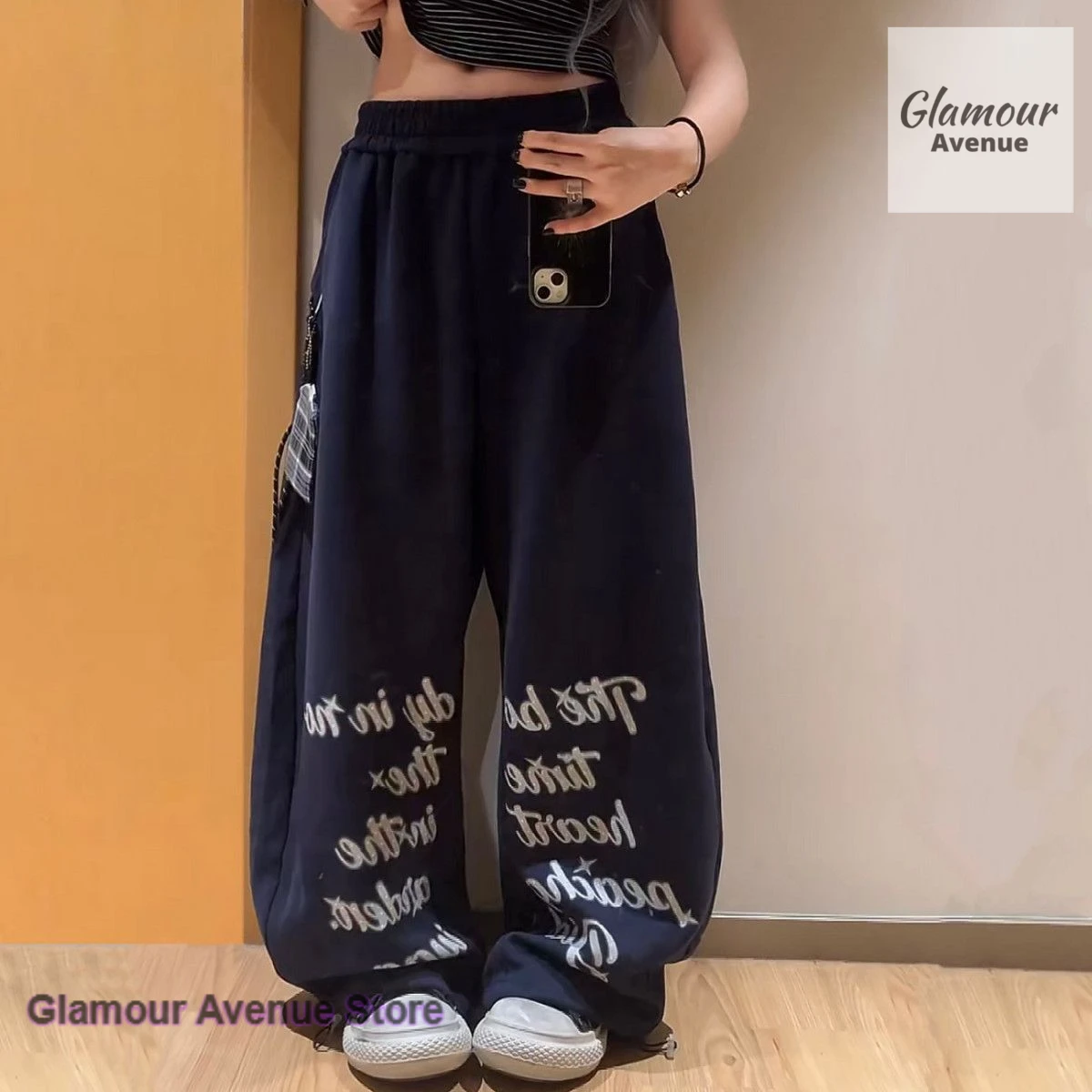 

American-style hip-hop pants women spring and summer new street fashion Joker temperament printed wide-leg casual pants.