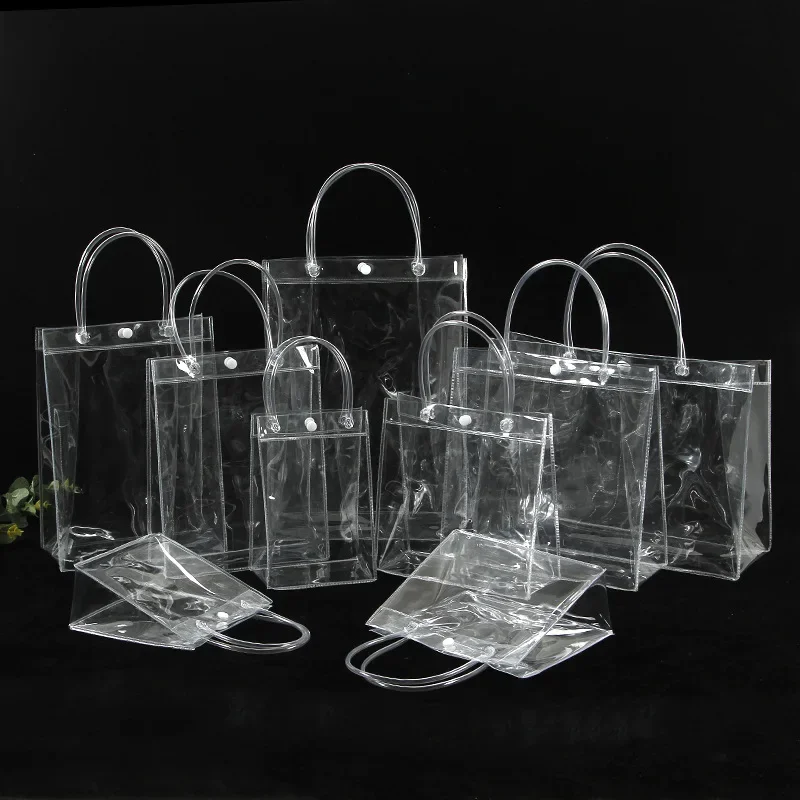 100PCS lot Transparent Soft PVC Gift Tote Packaging Bags with Hand Loop Clear Plastic Handbag Cosmetic Bag