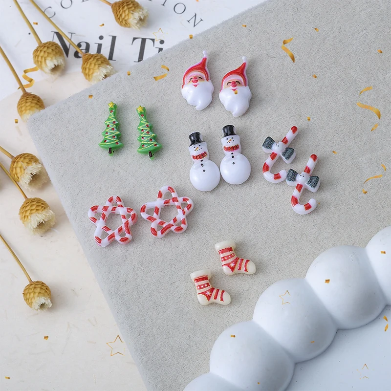 10pcs คริสต์มาสเรซิ่นเล็บอุปกรณ์เสริม 3D การ์ตูน Santa Claus Cane ถุงเท้า Snowman Nail Art Design อุปกรณ์ตกแต่ง