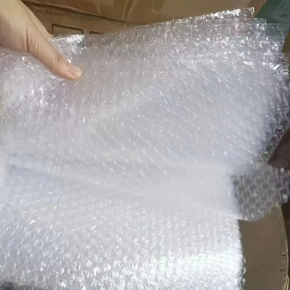 Stoßfeste, vibrationsdämpfende, doppellagige Polsterung mit Luftpolsterfolie und Schaumstoffpolsterung für den Versand von zerbrechlichen Gegenständen, Verpackungsmaterial. – Detail 10