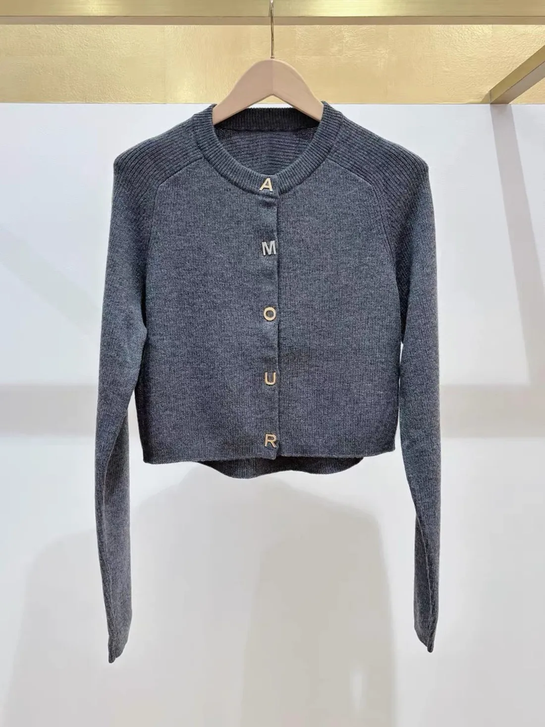 High-End Gebreide Lange Sve Ronde Ne Knoop Casual Faion Damestrui Europese Sle Faionable Veelzijdige Top