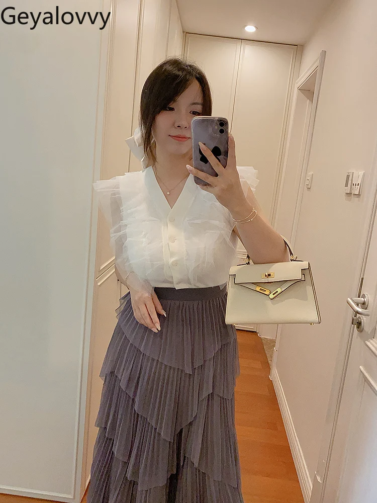 Nuovo prodotto estivo dolce tulle giapponese fungo bordo maniche volanti scollo a V maglione lavorato a maglia dimagrante gilet corto per le donne