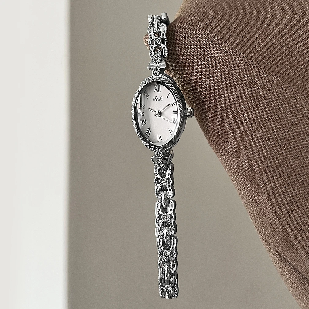 

2025 НОВЫЕ винтажные серебряные женские часы GEDI с римскими цифрами и овальным циферблатом, женские кварцевые наручные часы, подарочные аксессуары