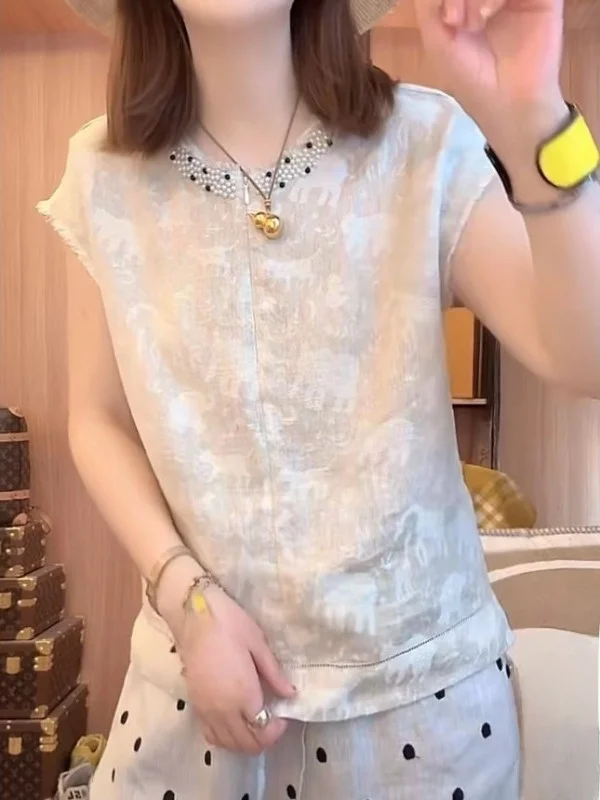 Ciężko zdobiona lniana bluzka lub sukienka damska letnia luźna plus size casual wyszczuplająca z efektem modelującym sylwetkę, haftowana.