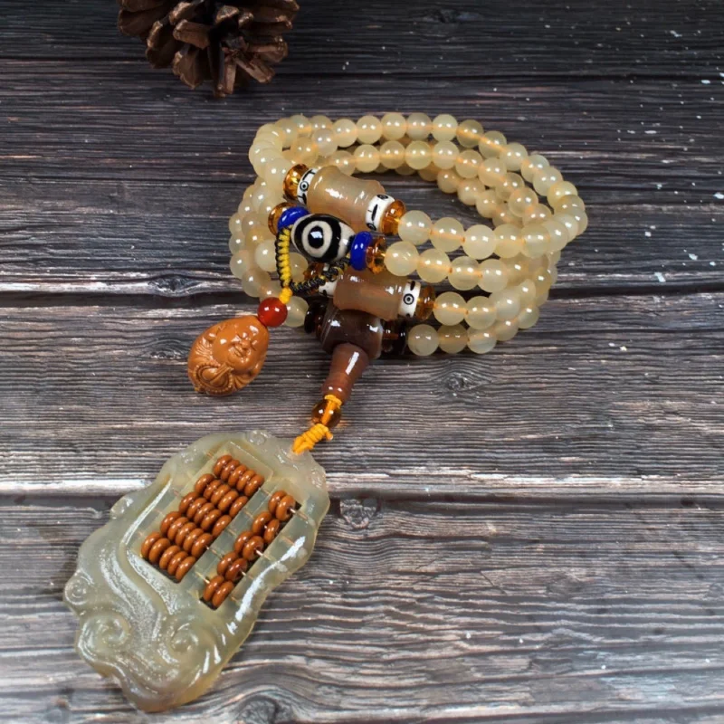 

Natural beads, size 8MM, with a horn Ruyi abacus a small olive pit pendant for meditation and Buddhist prayer
