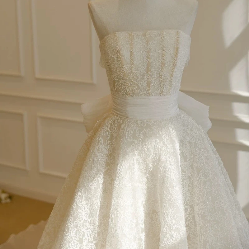 

Customized satin white Ball Gown Royal Wedding Dresses Lace Long tail Big Bow Made Robe De