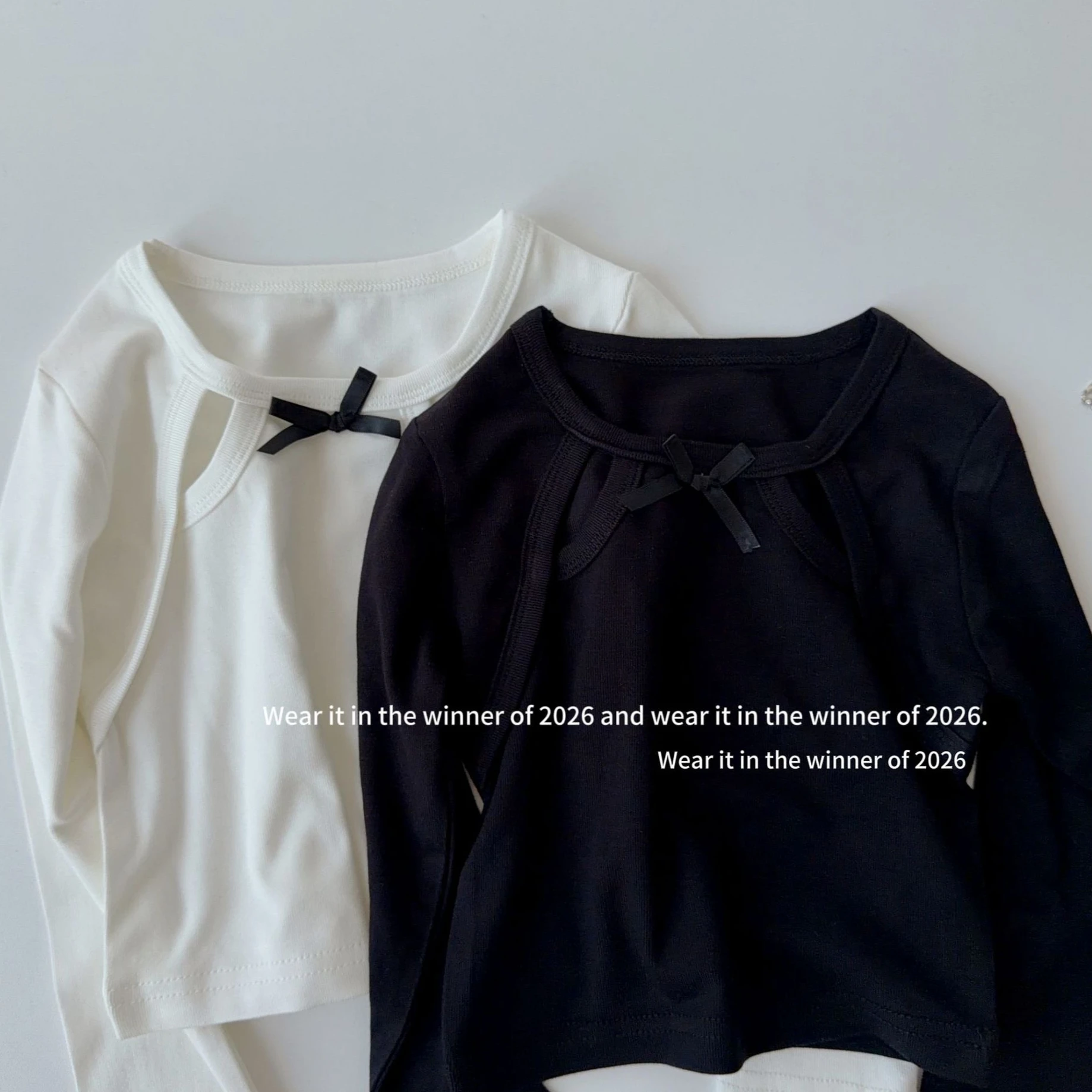 Girls T-shirt 2026 Spring and Autumn New Children's Clothing Korean Style Girl Baby Design Hollow Knit Fake Two Bow T-shirt