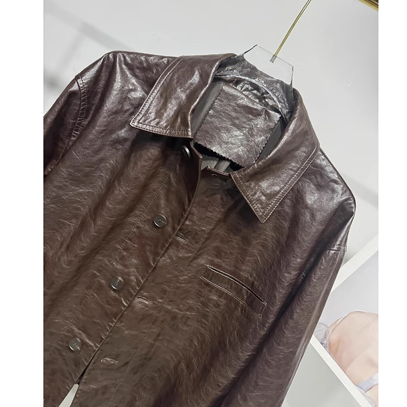 سترة نسائية لخريف وشتاء 2025 ملابس شعبية ملابس خارجية للنساء أسود/قهوة من جلد الغنم الطبيعي معطف قصير للدراجات النارية