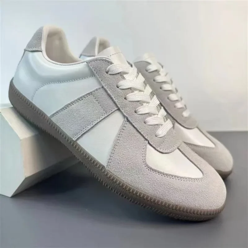 Męskie buty ze skóry naturalnej wiosna/jesień nowy Trend wszechstronne sportowe buty Casual miękkie podeszwa designerskie mokasyny męskie trampki