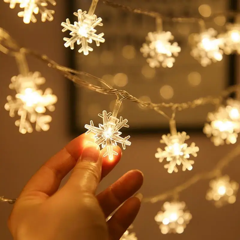 Świąteczne łańcuchy świetlne na zewnątrz 80 LED Wodoodporne łańcuchy świetlne w kształcie płatka śniegu Dekoracyjne świąteczne łańcuchy świetlne z 2 trybami dla