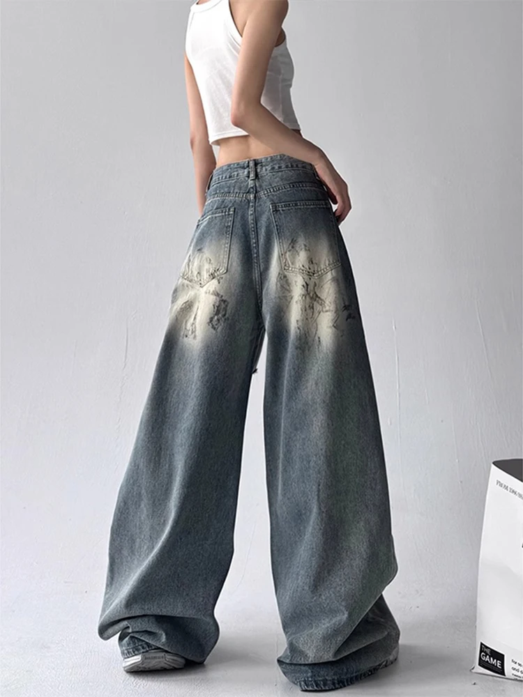 بنطال جينز أمريكي ساخن عصري بفتحة مكسورة للنساء لصيف 2025 تصميم جديد للإحساس فضفاض وواسع الساق مستقيم الساق على الأرض #2