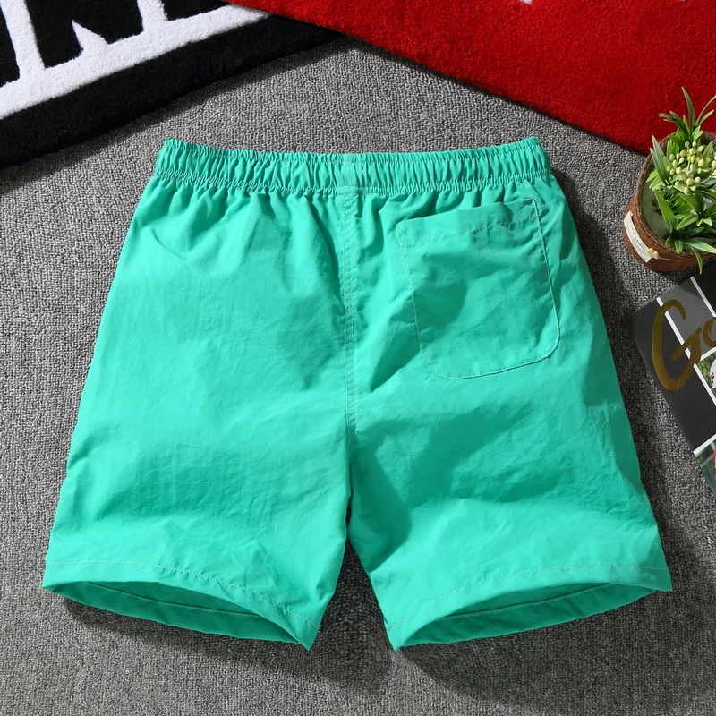 Shorts de praia masculino solto elástico na cintura, calça curta casual com cordão, streetwear verão, plus size