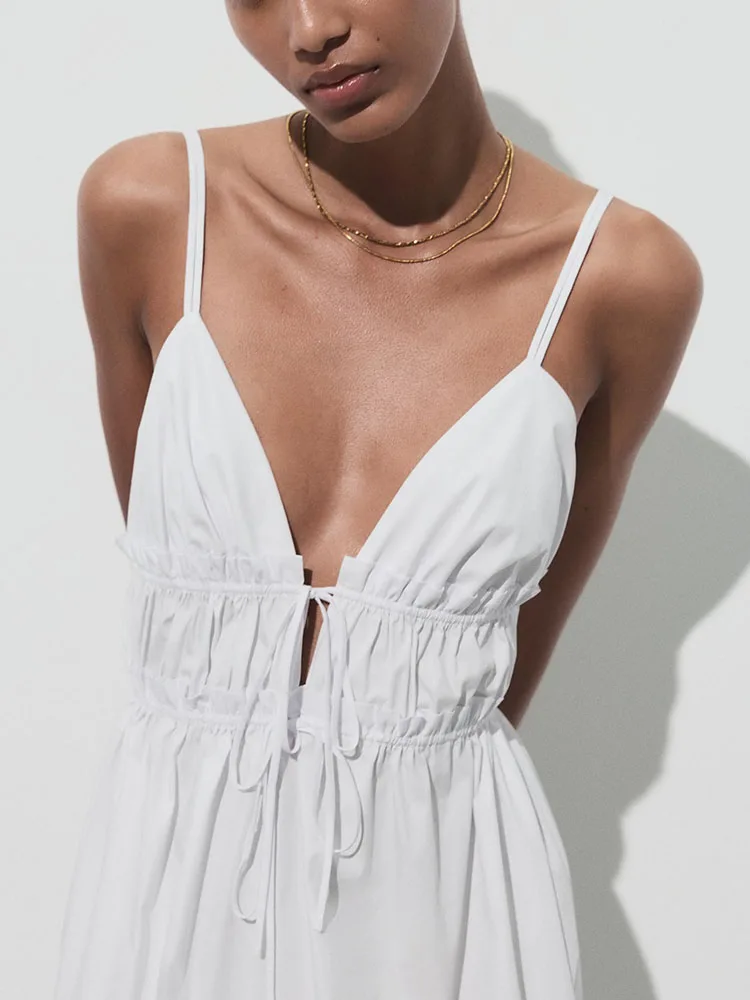 فستان صيفي جديد بسيط وأنيق من الشاش الحريري بدون حمالات وظهر مكشوف متوسط الطول بخصر مرتفع وتنورة طويلة للحفلات بلون واحد