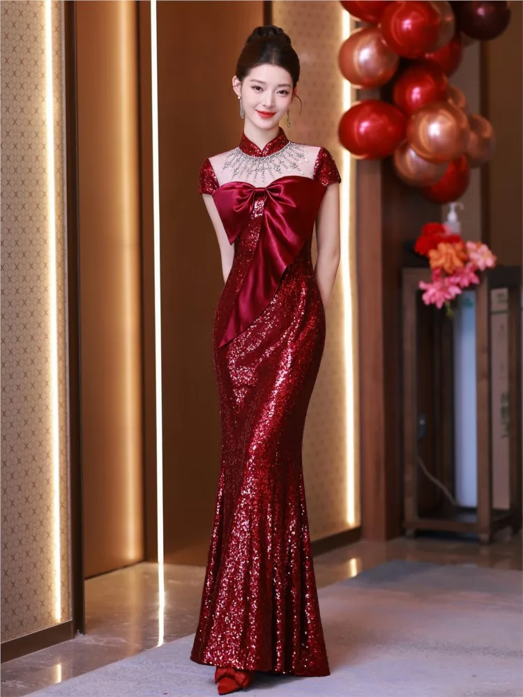 

A unique and stylish red sequined fishtail dress for toast