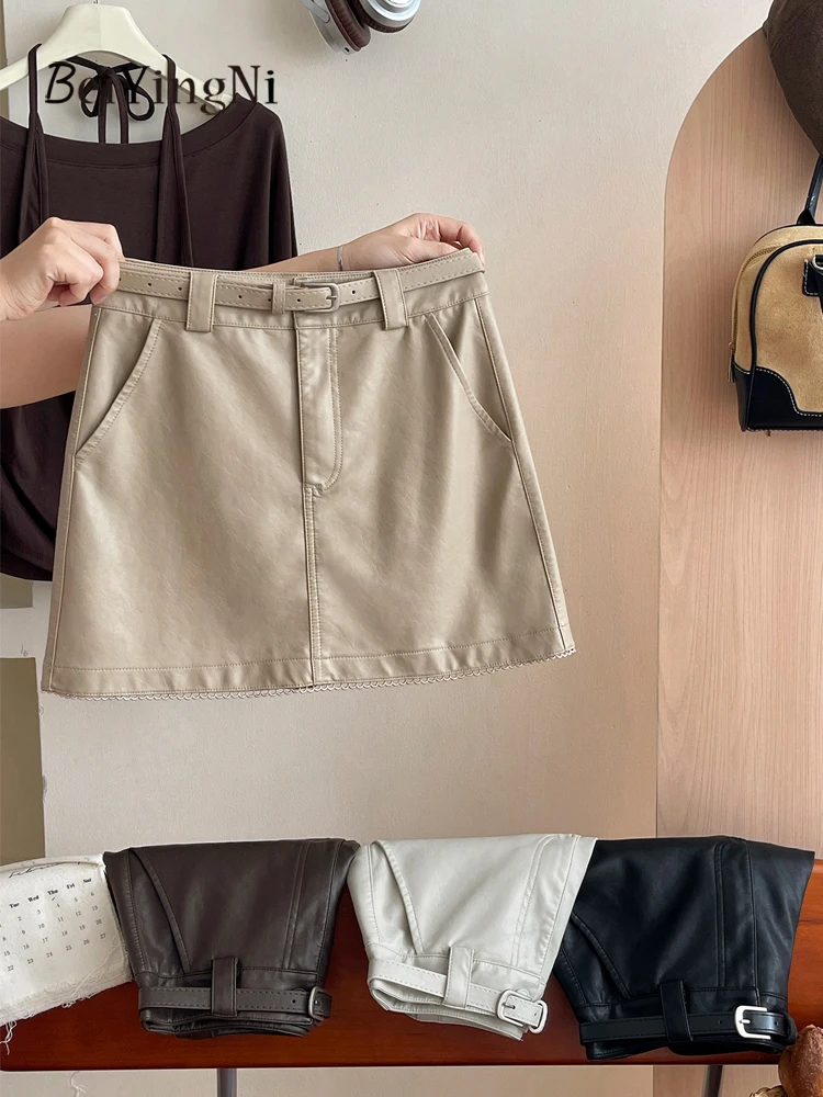 

Beiyingni 2021, осенне-зимняя женская юбка из искусственной кожи с поясом, уличная одежда, винтажные универсальные корейские шикарные короткие мини-юбки трапециевидной формы, женские